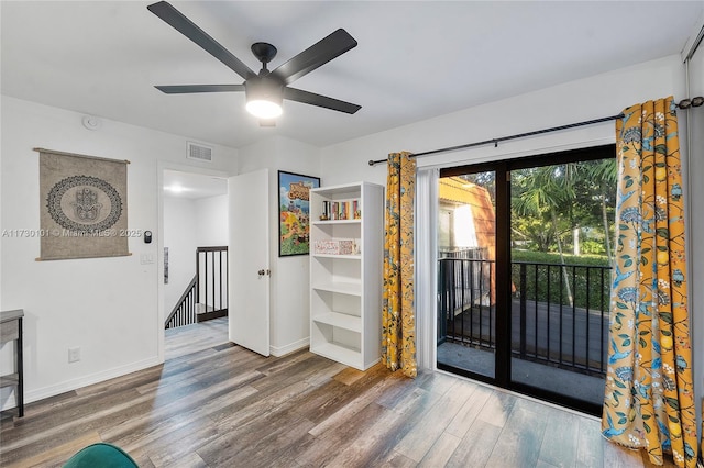 interior space with hardwood / wood-style flooring and ceiling fan