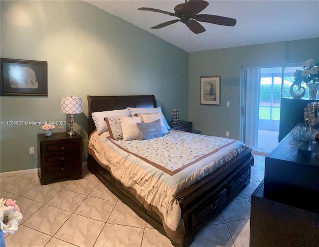 tiled bedroom with ceiling fan