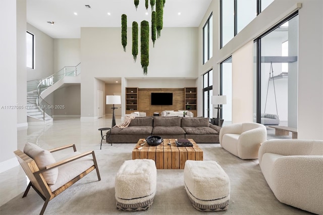 living room with a towering ceiling