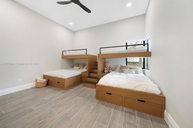 3275 Islewood Ave, Weston, FL 33332 - bedroom with light wood-style flooring, ceiling fan, and baseboards
