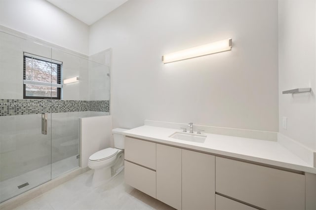 3275 Islewood Ave, Weston, FL 33332 - full bathroom featuring a shower stall, tile patterned floors, vanity, and toilet