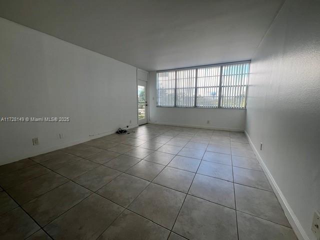 view of tiled empty room