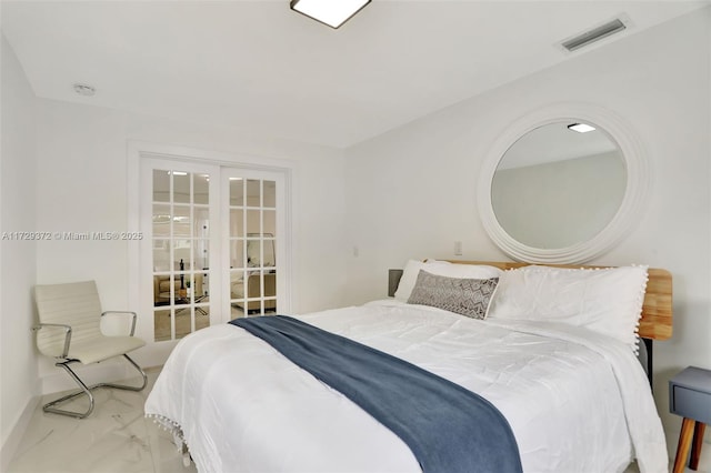 bedroom featuring french doors