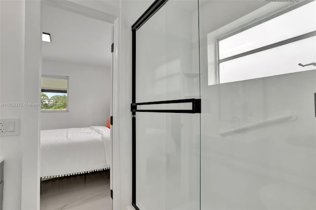 bathroom featuring an enclosed shower