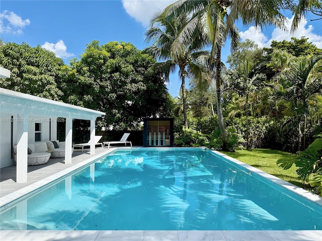 view of swimming pool featuring a patio area and an outdoor hangout area