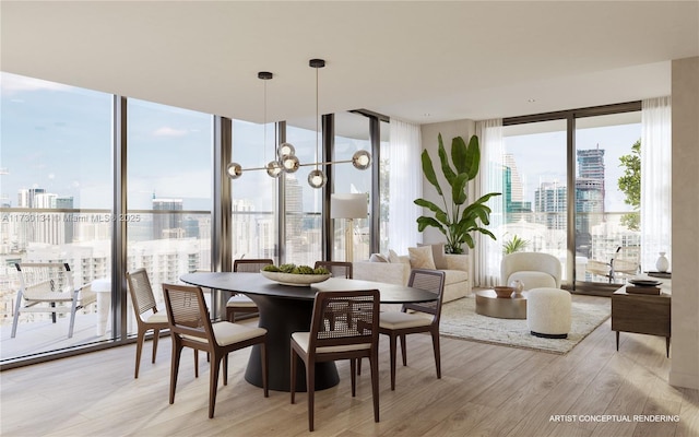 dining area featuring a notable chandelier, light wood-type flooring, a wall of windows, and a wealth of natural light