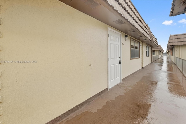 view of home's exterior with stucco siding