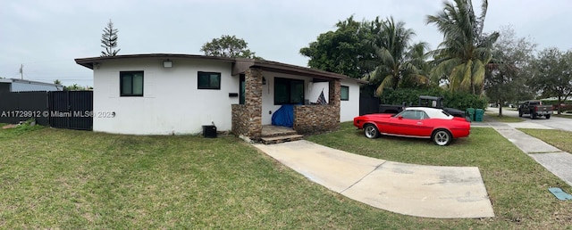 view of front of home with a front yard