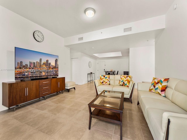 living room with light tile patterned floors