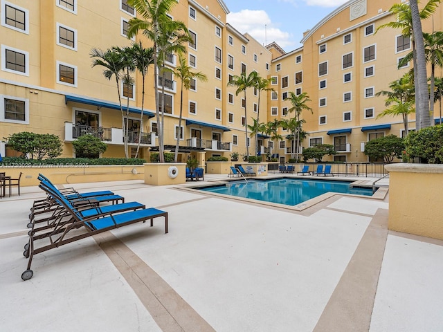 view of pool featuring a patio area