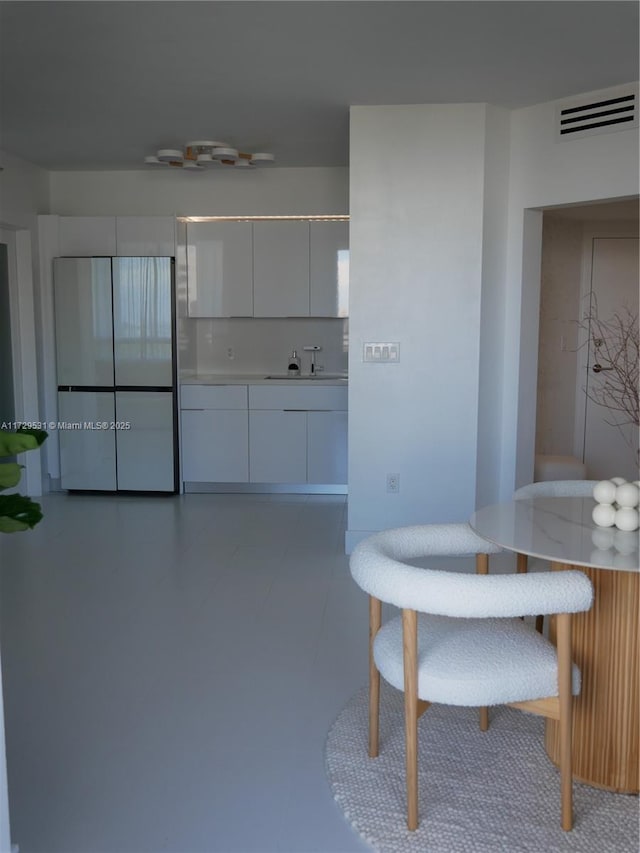 unfurnished dining area with sink