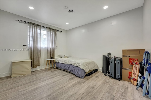 bedroom featuring light wood-type flooring