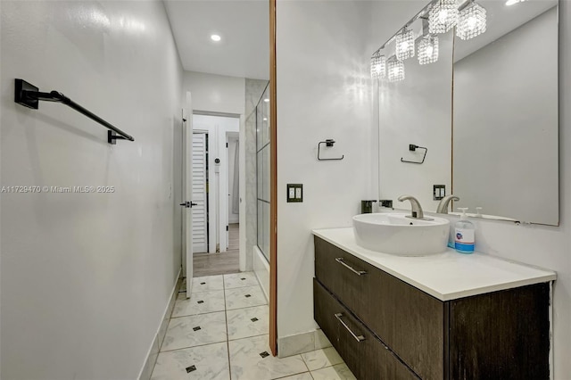 bathroom with vanity, shower / bath combination with glass door, and tile patterned floors