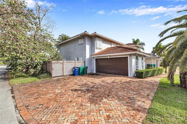 view of home's exterior featuring a garage