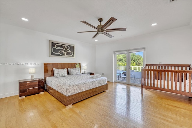 bedroom featuring wood-type flooring, ceiling fan, and access to outside