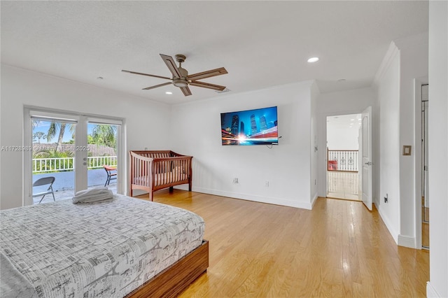 bedroom featuring crown molding, light hardwood / wood-style flooring, ceiling fan, and access to outside