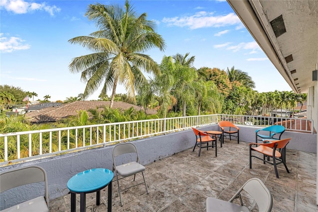 view of patio with a balcony