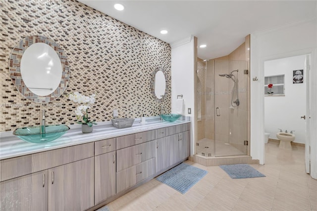 bathroom featuring vanity, a bidet, a shower with shower door, and tile patterned flooring