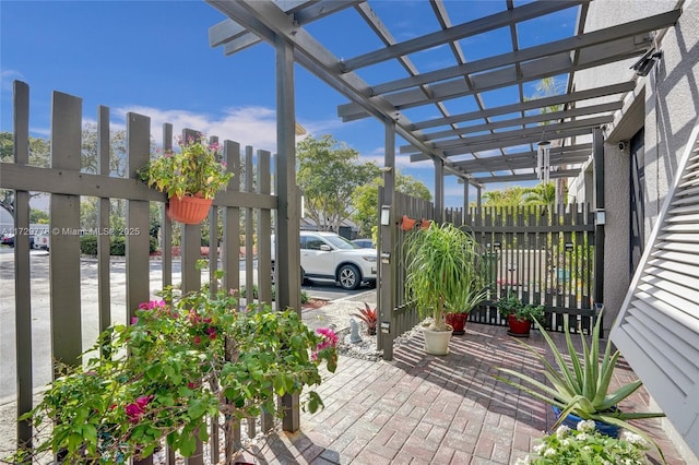 view of patio featuring a pergola