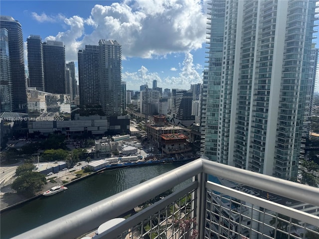 property's view of city featuring a water view