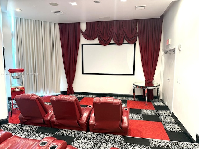 cinema with baseboards and visible vents