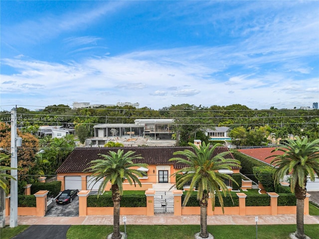 view of front of property featuring a garage