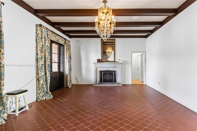 unfurnished living room with a chandelier and beamed ceiling