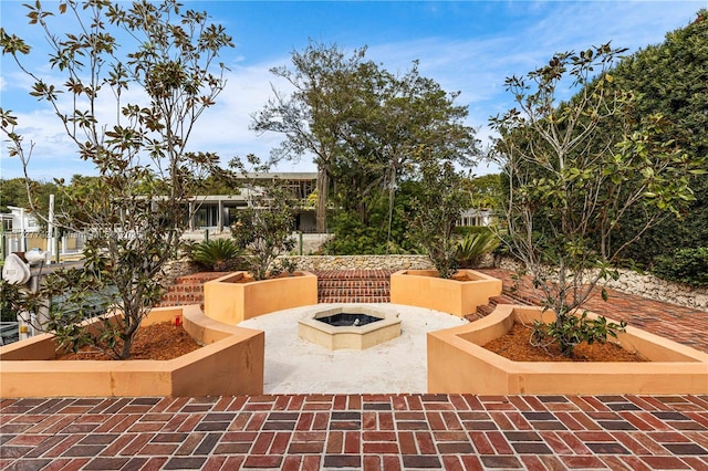 view of patio featuring a fire pit