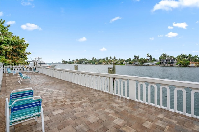 view of patio featuring a water view