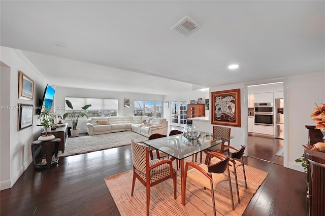 dining room featuring dark hardwood / wood-style floors