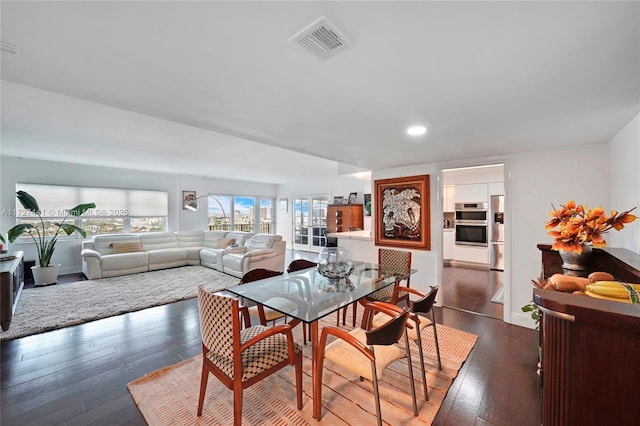 dining room featuring dark wood-type flooring