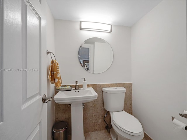 bathroom featuring toilet