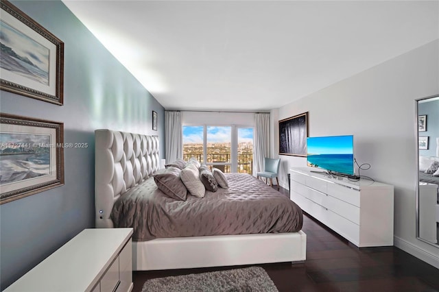 bedroom featuring dark wood-type flooring