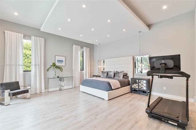 bedroom with light hardwood / wood-style flooring