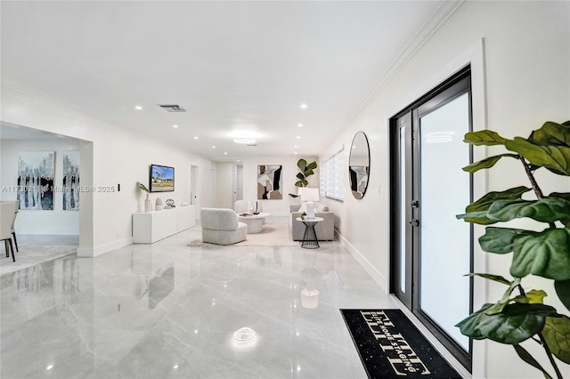 living room featuring crown molding