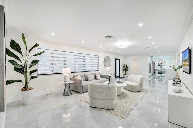 living room featuring ornamental molding