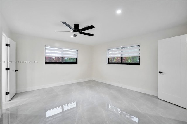 unfurnished room featuring ceiling fan