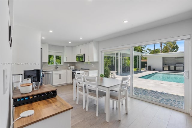 dining room featuring sink