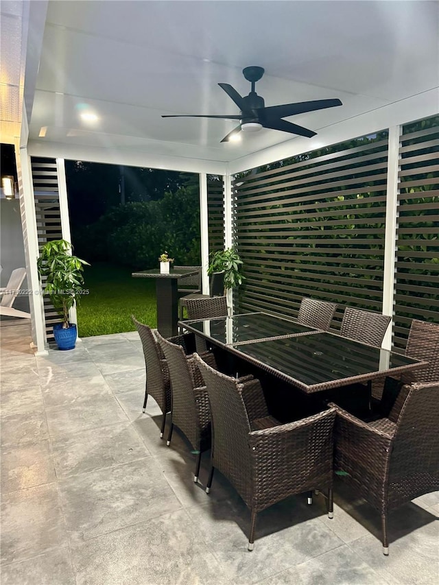 view of patio featuring ceiling fan