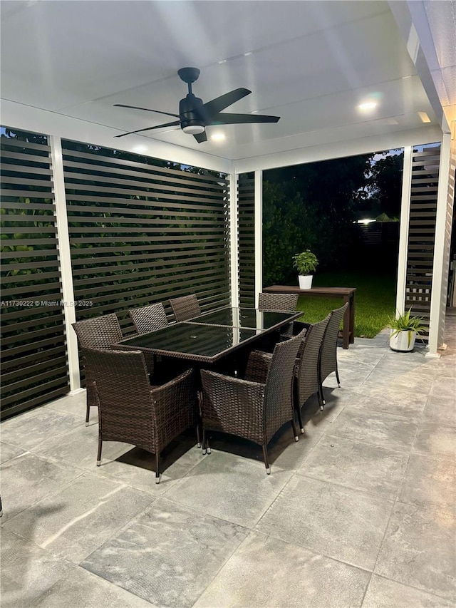 view of patio featuring ceiling fan