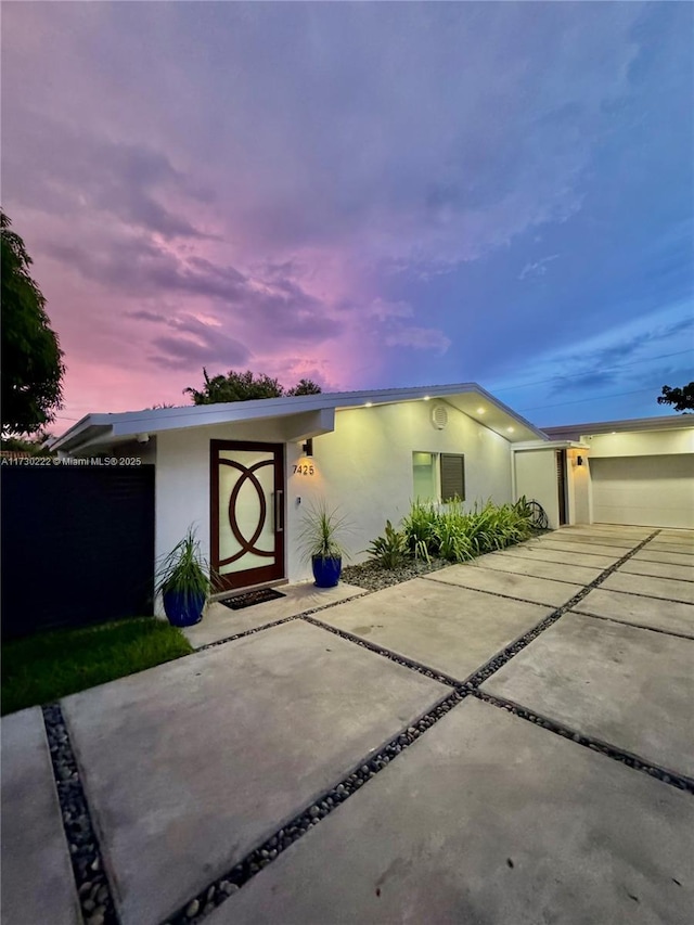 view of front of house with a garage