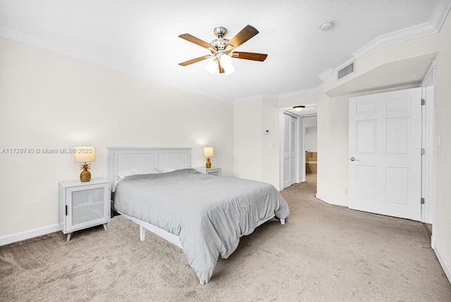 bedroom featuring ceiling fan, carpet floors, and crown molding