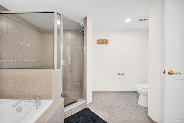 bathroom with independent shower and bath, toilet, and tile patterned floors