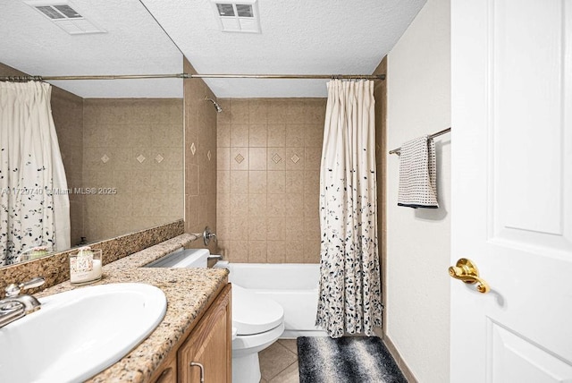 full bathroom featuring toilet, a textured ceiling, shower / tub combo, and tile patterned floors