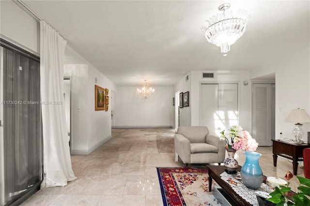 living room featuring a chandelier