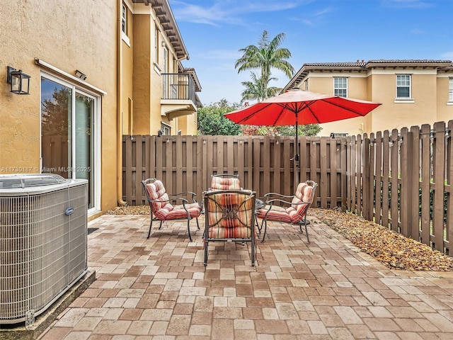 view of patio featuring cooling unit