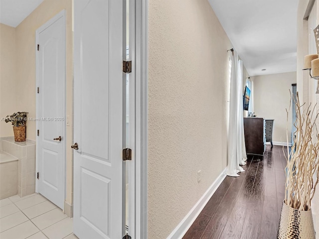 hallway featuring light hardwood / wood-style floors