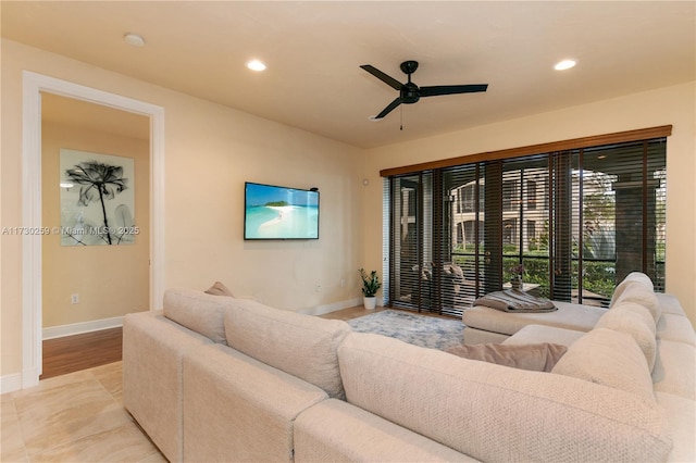 living room featuring ceiling fan