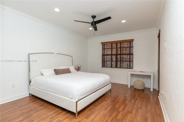 bedroom with ornamental molding, ceiling fan, and hardwood / wood-style floors