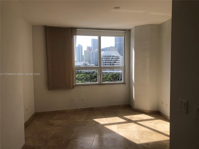 view of tiled spare room